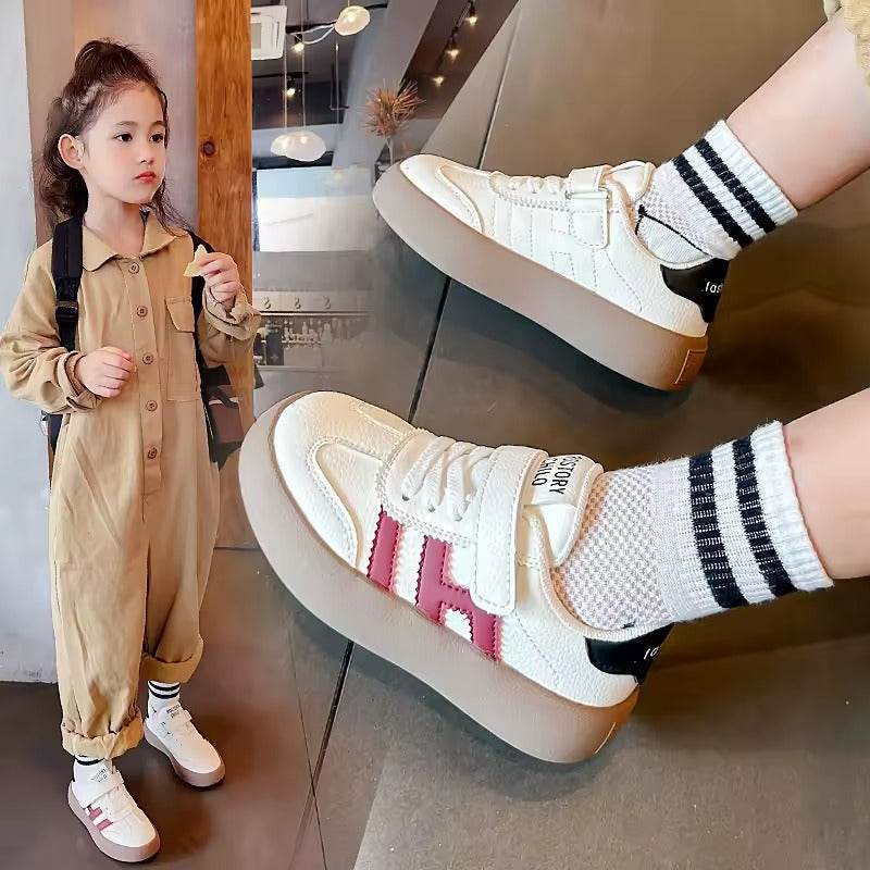 Stylish and comfortable unisex shoe, with great flexibility and a practical design with Velcro strap. - IRRAKIDS