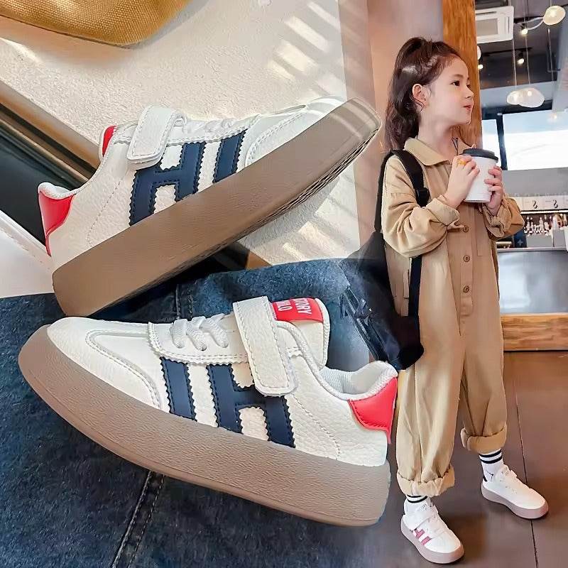 Stylish and comfortable unisex shoe, with great flexibility and a practical design with Velcro strap. - IRRAKIDS