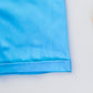 Ensemble amusant d'été pour enfants : chemise boutonnée avec imprimé coloré et short cyan cool