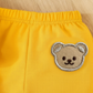 Ensemble 3 pièces pour garçon et fille : un t-shirt avec imprimé ours, un sweat à capuche et un pantalon de sport.Ensemble 3 pièces pour garçon et fille : un t-shirt avec imprimé ours, un sweat à capuche et un pantalon de sport.