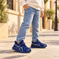 Baskets sportives pour enfant en mesh avec détails latéraux contrastants, semelles ajourées sculptées et fermeture à lacets ou auto-agrippante — Chaussures de tous les jours