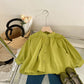 Stylish girls outfit with a modern touch - loose olive blouse with attractive pleated jeans - IRRAKIDS