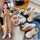 Stylish and comfortable unisex shoe, with great flexibility and a practical design with Velcro strap.